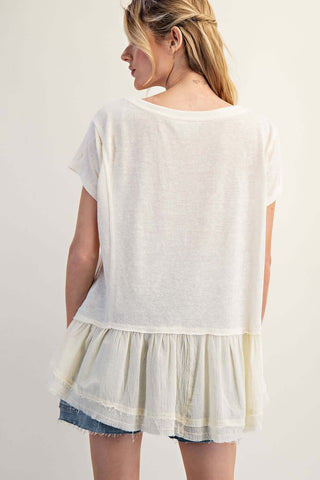 Alt text: "Soft Washed Ruffle Hem Wide Neck Top in Charcoal - Casual Fashion Statement Available in 2 Colors.