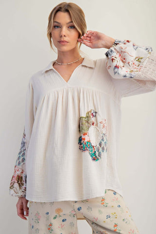 Easel Ecru Tunic Top with Patchwork Flower and Mixed Fabric Sleeves, stylish and unique boho-chic fashion piece.