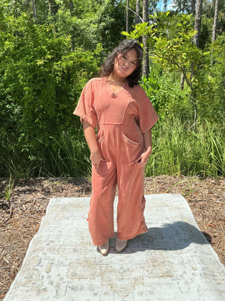 Paprika spice mineral wash jumpsuit with a drawstring hem and relaxed fit