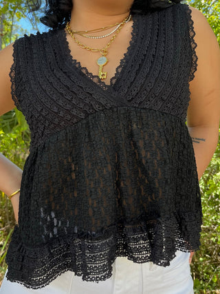 Black lace V-neck tank top with textured crochet pattern and scalloped lace hem.
