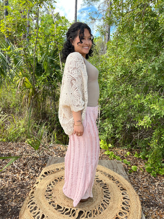 POL Strawberry Twirl Wide Leg Pants in pink with cream open-knit cardigan and taupe tank top.
