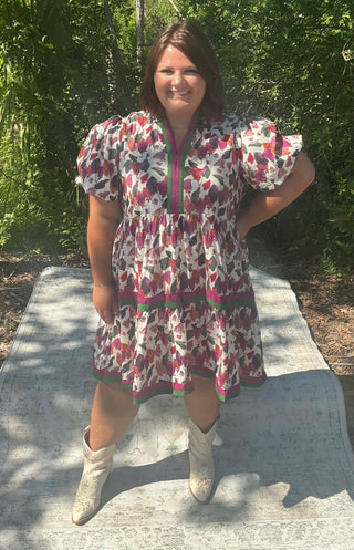 Plum floral print dress with bubble sleeves and a stylish band accent
