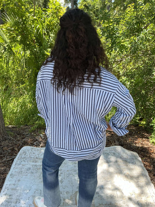 Light blue textured stripe long sleeve button-down shirt with a relaxed fit and classic collar