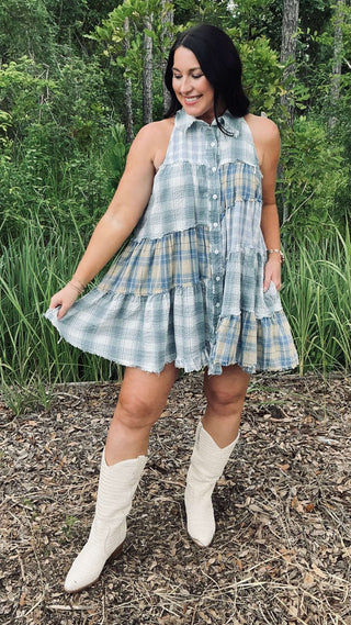 Blue velvet sleeveless tunic dress with button-down collar, shown in one of three available colors for stylish versatility.