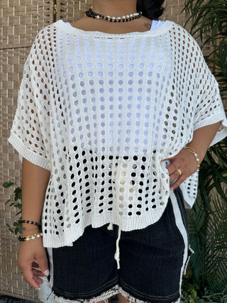 White open-knit dolman top with eyelet pattern and relaxed fit.
