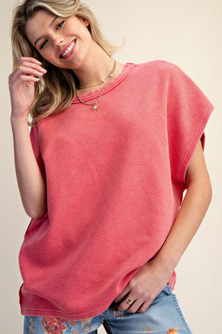 Coral pink ribbed knit oversized drop shoulder tee with crew neckline.
