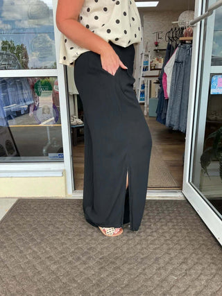 Black Gauze Smocked Waist Wide Leg Palazzo Pants – Cozy Co. Fashionable and comfortable pants for any occasion.