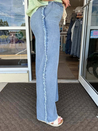 Light denim vintage wash straight leg pants with fringe trim, NoaBoa. Casual and stylish for everyday wear.