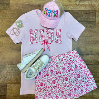 MAMA Coquette Bow Tee Top: Stylish, versatile top with bow detail. Available in multiple colors for every wardrobe.
