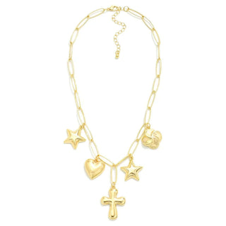Gold Cross, Star & Heart Charm Necklace on a jewelry display, featuring elegant charms on a delicate chain.