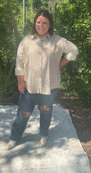 Light blue textured stripe long sleeve button-down shirt with a relaxed fit