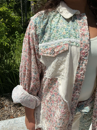 Ivory hi-lo shacket top with floral print and crochet detail