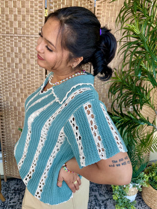 Jade crochet short-sleeve top with white lace striped pattern and openwork details.
