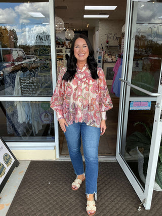 Pink paisley print top with long bubble sleeves, featuring a bohemian design, ideal for chic, casual style.