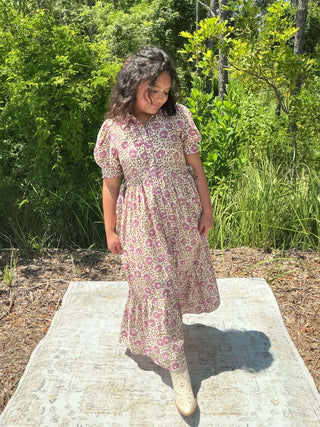 Orchid floral midi dress with button front and scallop trim, featuring a fitted bodice and flowing skirt
