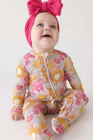 Posh Peanut Rosalinda Ruffled Footie One Piece: Stylish pink floral baby outfit with ruffles, perfect for comfort and elegance.