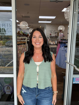 Stylish Crochet Button Front Vest Top in white, featuring a sleeveless design with a textured pattern. Available in 2 colors.