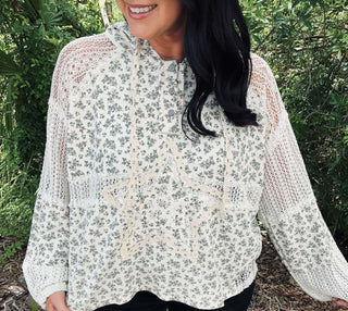 Cream and gray floral star patch hoodie with crochet detail, featuring a unique boho-chic design for a stylish look.