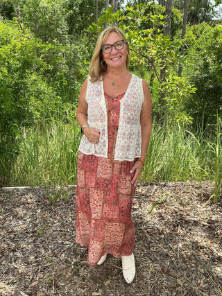 Polagram Dress Terracotta Dream Floral Patchwork Maxi with long sleeves and ruffled hem, displayed on a white background