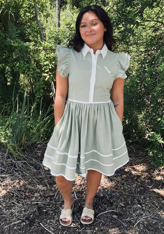Elegant Matcha Green Linen Blend Dress with White Trim, featuring a stylish silhouette, perfect for casual and formal occasions.