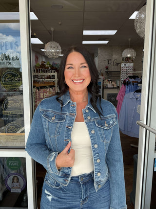 Judy Blue Classic Vintage Wash Denim Jacket on mannequin, showcasing tailored fit, button-front, and timeless blue wash design.