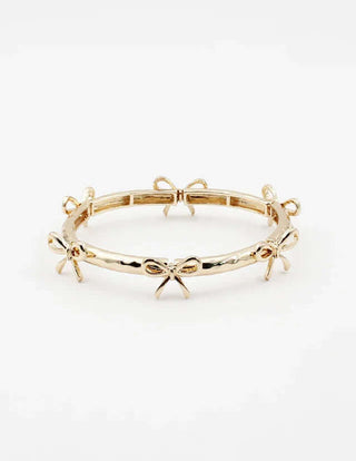 Gold Bow Stretch Bracelet Coquette: A chic, flexible bracelet featuring a delicate bow design, perfect for elegant, modern styles.