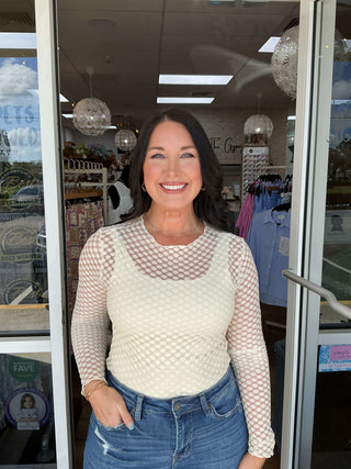 Elegant cream round neck layering top with dot lace mesh long sleeves, perfect for a stylish and sophisticated look.