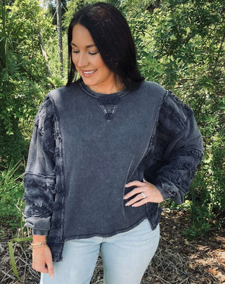 Stylish oversized Easel long sleeve top with washed terry fringe stripe contrast, available in three colors.