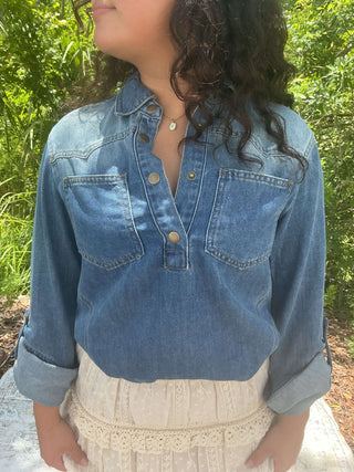 Light blue vintage denim top with pockets and a western yoke design
