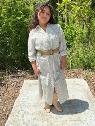 Blue striped midi dress with delicate embroidery and a flattering silhouette