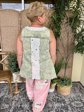 Olive green floral tank top with white lace trim and center panel detail, oversized fit.
