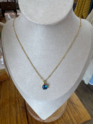 Elegant BIRTHSTONE Necklace by Lauren Kenzie, featuring timeless design and lifetime warranty, displayed in a stylish presentation box.