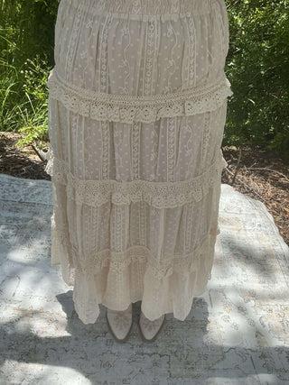 Ecru maxi skirt featuring tufted dot lace tiers for a stylish and feminine look