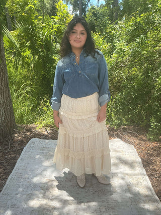 Light blue vintage denim top with pockets and a western yoke design