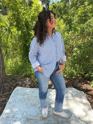 Light blue textured stripe long sleeve button-down shirt with a relaxed fit