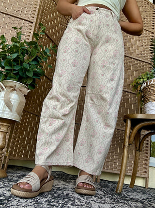 Cream vintage baroque floral gypsy fit pants with pink and gray pattern details.
