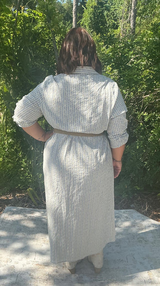 Blue striped midi dress with delicate embroidery and a flattering silhouette