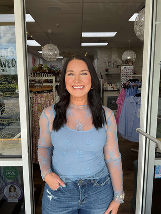 Sky blue sheer floral lace long sleeve top by Easel, perfect for stylish layering and adding an elegant touch to any outfit.