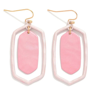 Light pink hexagon nesting earrings with a modern, geometric design, perfect for adding a stylish touch to any outfit.