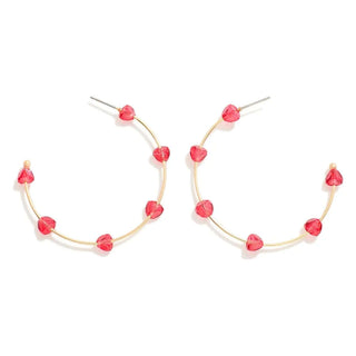 Red bead wire hoop earrings featuring intricate design, perfect for adding a touch of elegance to any outfit.