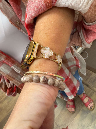 Opal Clover & Gold Apple Watch Band in 42/44/45/49mm sizes, featuring chic design and durable materials for style and comfort.