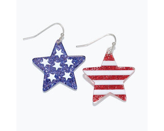 Patriotic glitter star earrings with blue stars and red-white striped design on silver hooks.
