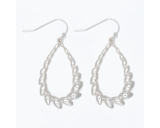 Silver teardrop earrings with leaf-textured details and wire hooks on white background.
