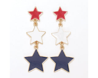 Red, white and blue enamel star dangle earrings with gold-tone linking details.
