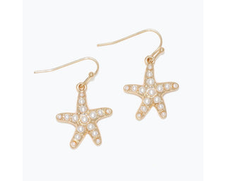 Gold starfish drop earrings with pearl embellishments and gold hook closures.
