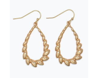 Gold twisted teardrop dangle earrings with leaf-textured details and fish hook closures.
