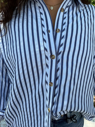 Light blue textured stripe long sleeve button-down shirt with a relaxed fit and classic collar