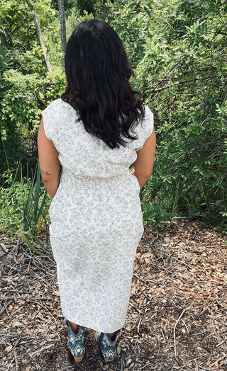 Ivory & Blue Floral Boat Neck Pleated Sleeveless Midi Dress on Mannequin, Front View - Elegant Spring/Summer Fashion