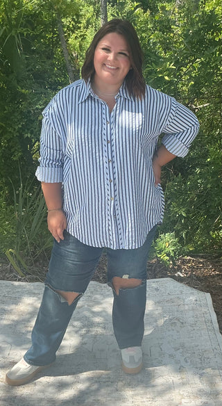 Light blue textured stripe long sleeve button-down shirt with a relaxed fit
