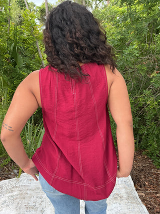Light gray sleeveless tank top with contrast stitching, perfect for layering or casual wear